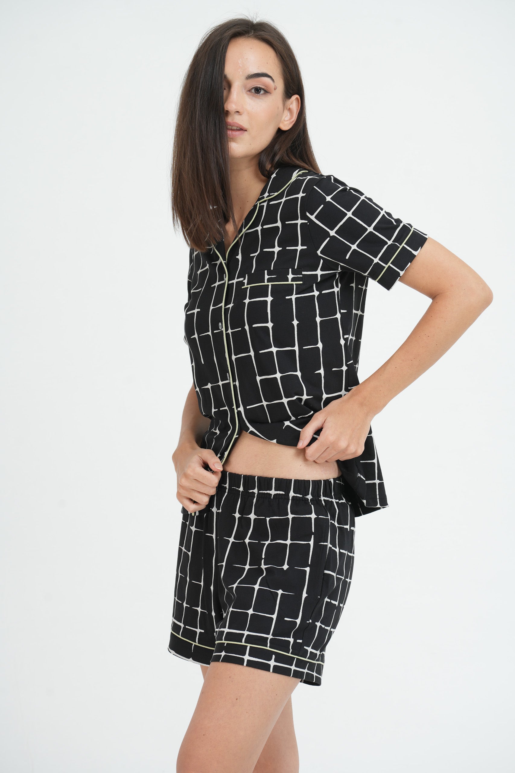 GREEN HINTS, Woman wearing comfortable sleepwear pajama, Relaxing sleepwear pajama for women, Cozy and stylish women's sleepwear pajama, Soft and breathable pajama for a good night's sleep, Lounge and sleep in this comfortable women's pajama, Comfy and stylish sleepwear for women, Sleep peacefully in this cozy women's pajama set, Relax in comfort with this women's sleepwear pajama, Luxurious and soft pajama set for women, Stay comfortable all night in this women's sleepwear pajama